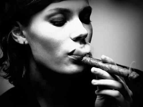woman smoking cigar bw stock photo r