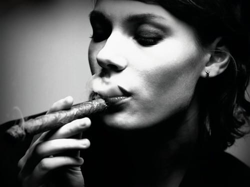 woman smoking cigar bw stock photo l
